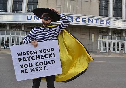 Fight for 15 activists protest the McDonald's All-American Games basketball tournament in Chicago