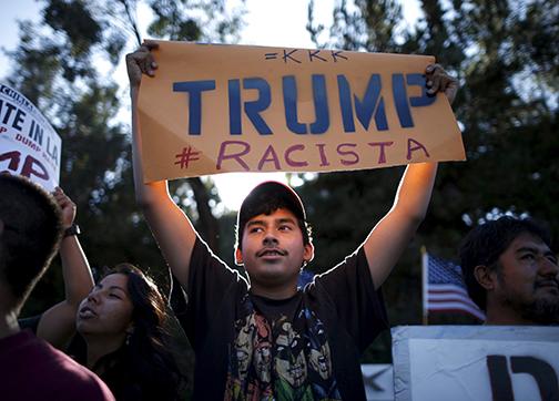 Protesters stand up against Donald Trump's bigotry and hate
