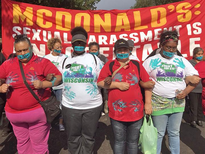 McDonald's workers hold a silent march against sexual abuse at the company's headquarters