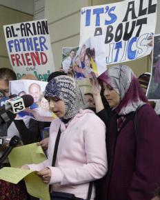 Leena Al-Arian reads a letter written by her father, witch-hunt victim Sami Al-Arian, at a February 2003 protest