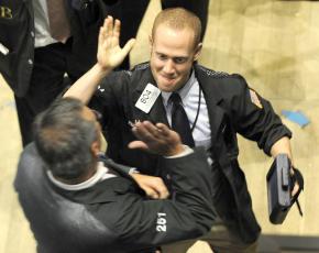 Traders on the floor of the New York Stock Exchange