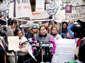 Parents, community members and supporters take their protest of the planned demolition of La Casita downtown