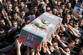 Mourners at the funeral for murdered nuclear scientist Mostafa Ahmadi Roshan