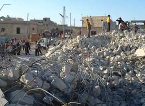 A building destroyed by U.S. air strikes in Idlib, a city in northwest Syria, far from ISIS's base