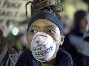 Protester against the non-indictment of NYPD officer Daniel Pantaleo for the murder of Eric Garner