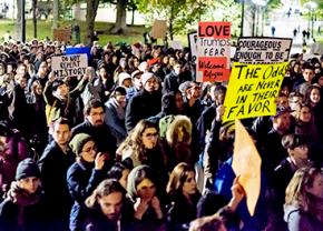 Hundreds of people rally in Boston to deny the governor's ban on Syrian refugees