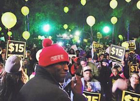 Fight for 15 worker activists protest outside the Democratic presidential debate in Charleston, South Carolina