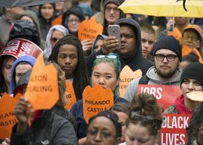 Marching to remember Alton Sterling and Philando Castille in Seattle