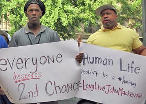 Protesters gathered outside the Lincoln Correctional Facility in Harlem to remember John Mackenzie