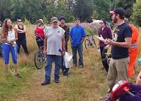 Supporters of the homeless residents of a camp gather in Portland